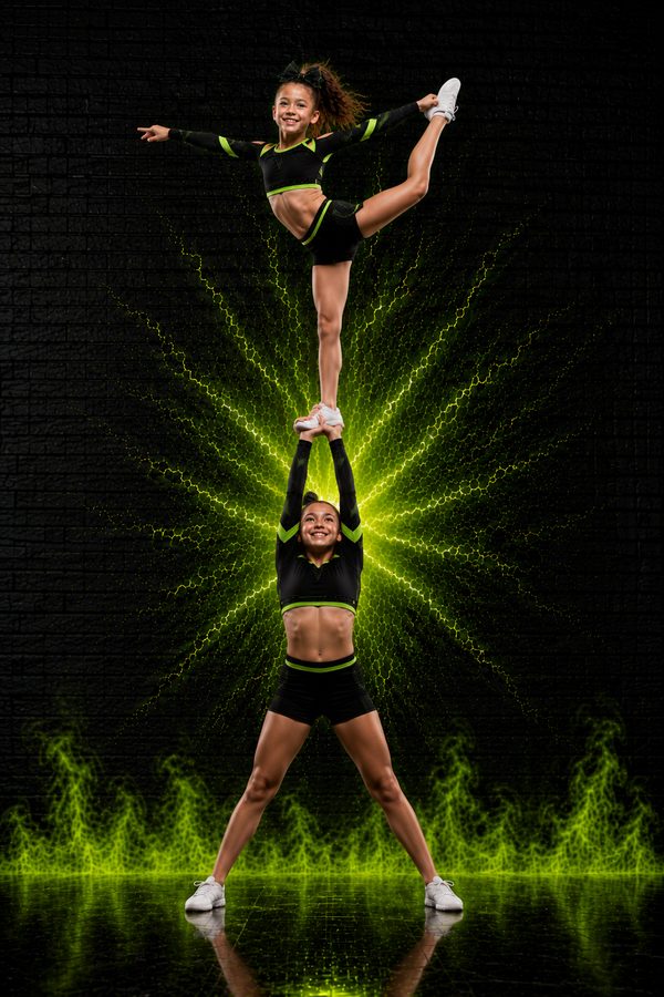 Tumble HQ flyer in a heel stretch stunt