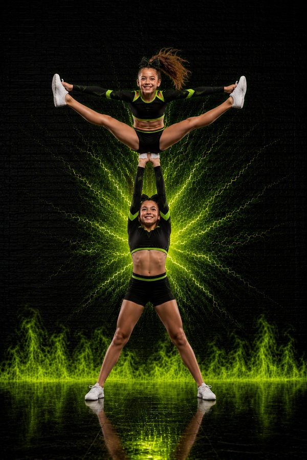 Tumble HQ flyer in a toe touch stunt
